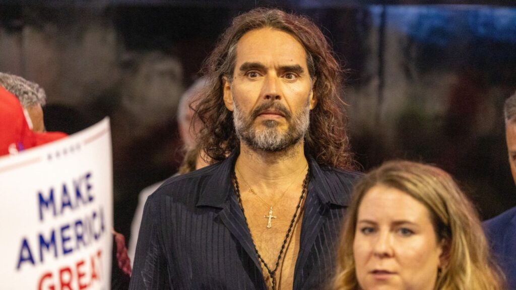 Russell Brand, the firebrand YouTuber, comedian and actor, appeared in a London court Monday for the start of a weekslong trial on charges of rape, sexual assault and indecent assault. (Shutterstock)