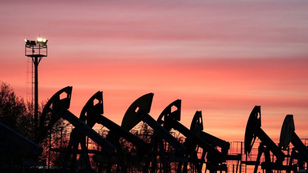 Sunset clouds glow over pump jacks at the Airankol oil field operated by Caspiy Neft in the Atyrau region, Kazakhstan, April 21, 2026. REUTERS/Pavel Mikheyev
