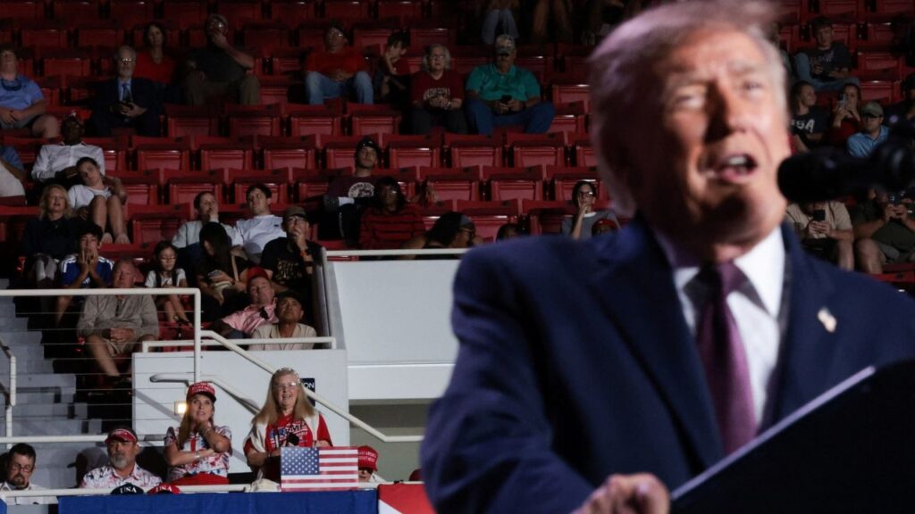 Supporters of US President Donald Trump listen as he speaks during a rally, ahead of the midterm elections, at The Mitchell Center at the University of South Alabama in Mobile, Alabama, US, October 2, 2026. REUTERS/Jessica Koscielniak