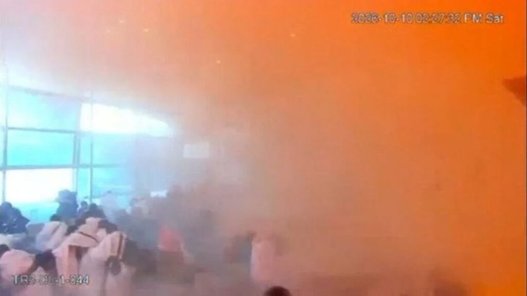 Surveillance footage shows people reacting amid smoke at the moment of an attack at King Khalid International Airport in Riyadh, Saudi Arabia, October 10, 2026, in this frame from a handout video. Saudi Ministry of Media/Handout via REUTERS