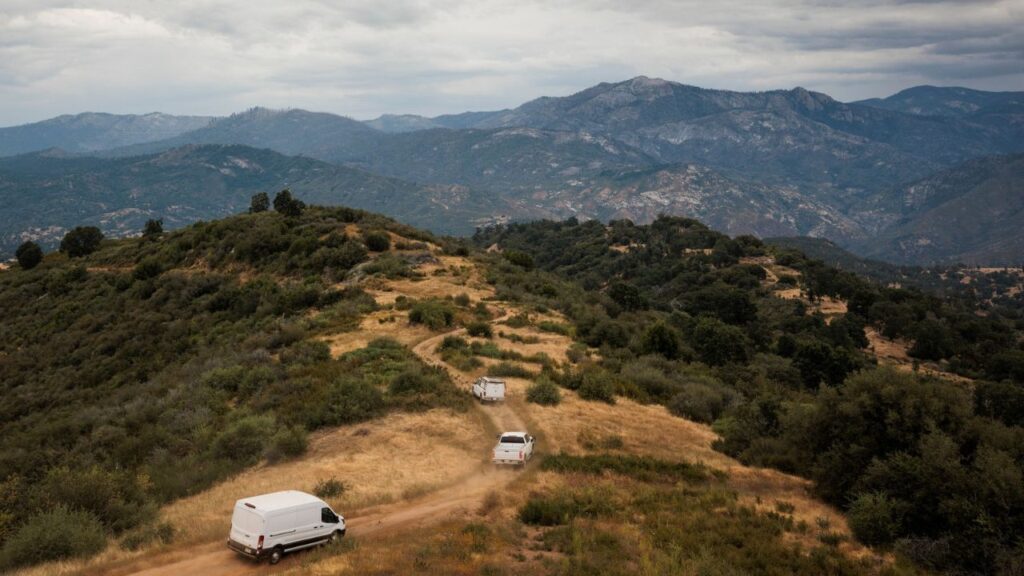 The Alert California team departs after installing wildfire cameras on an abandoned fire lookout at Shadequarter Mountain in Tulare County, Calif., July 13, 2026. The roving crew of California firefighters is installing cameras in some of the highest, craggiest sites in the state — all to get an early warning of a potentially deadly blaze. (Max Whittaker/The New York Times)