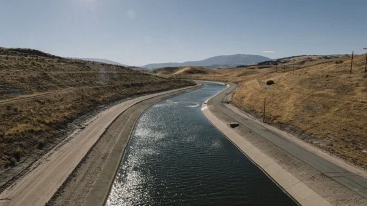 The California Aqueduct can be seen running through Tejon Ranch in Antelope Valley, Calif., Oct. 9 , 2026. Among the measures up for a vote in November is one that would amend the state’s landmark environmental law and make it easier to build large housing developments outside cities. (Mark Abramson/The New York Times)
