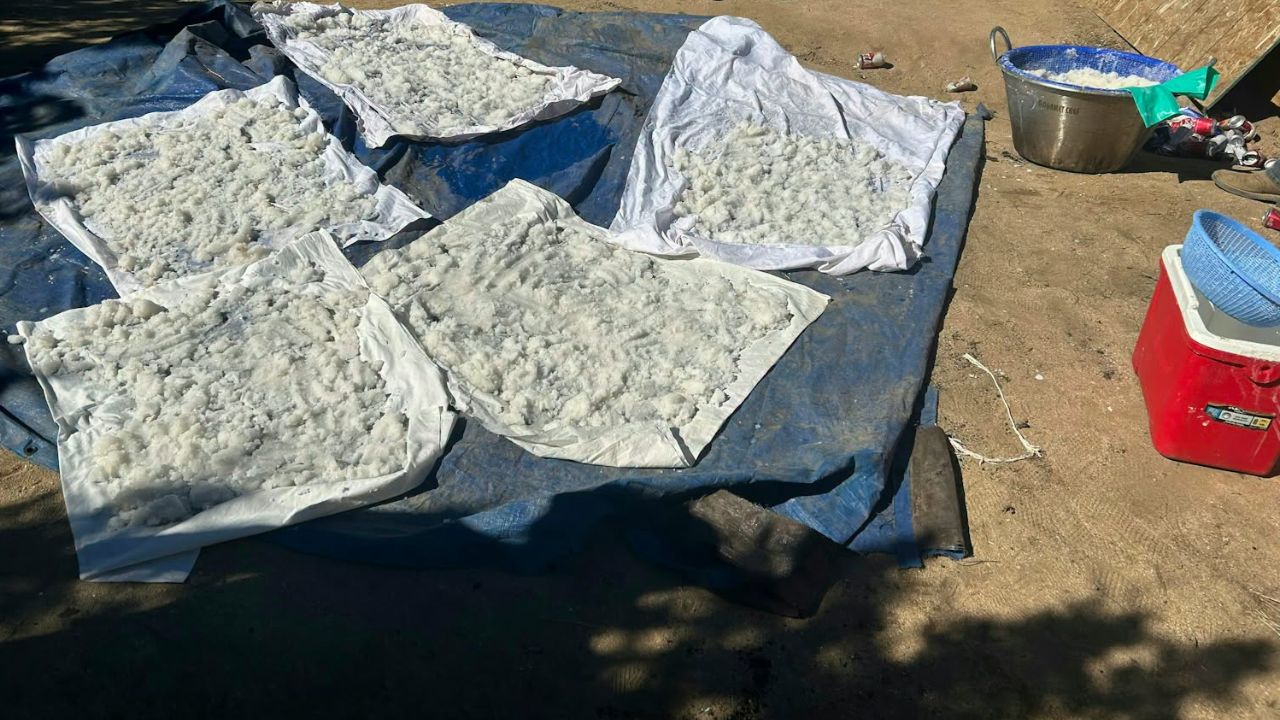 Three men were arrested after Kern County sheriff's investigators raided a methamphetamine conversion lab in Lancaster, seizing hundreds of pounds of methamphetamine, a stolen firearm, and cash. (Kern County SO)