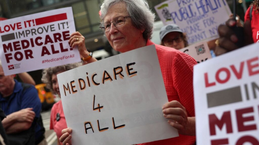 People participate in a rally on the 61st Anniversary of Medicare and Medicaid, across from Bellevue Hospital in New York City, U.S., July 30, 2026. Reuters/Shannon Stapleton