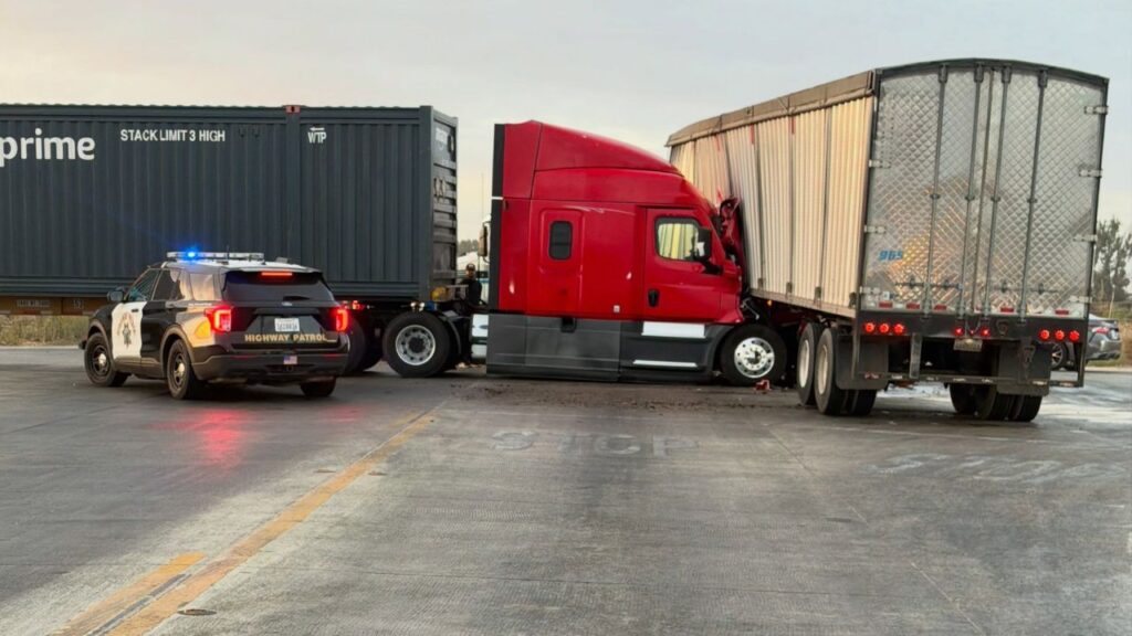Two semitrucks collided at Highways 165 and 140 in Merced County, blocking the roadway and requiring heavy-duty tow trucks to clear the scene, authorities said. (CHP)