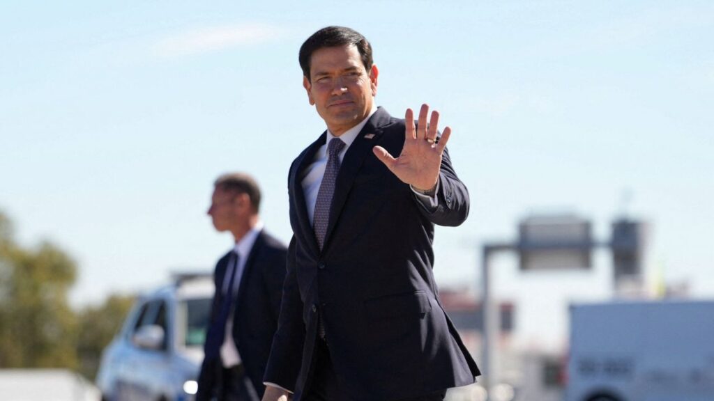 FILE PHOTO: US Secretary of State Marco Rubio gestures as he arrives at Lisbon Airport, Portugal, October 8, 2026. Mark Schiefelbein/Pool via Reuters/File Photo