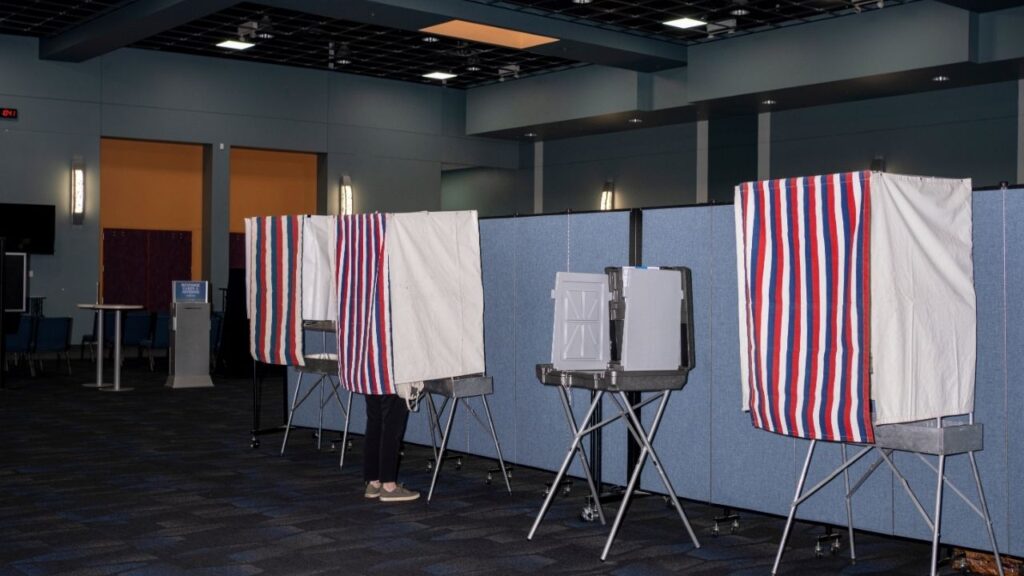 Voting booths for primary elections in Anchorage, Alaska, Aug. 18, 2026. The State of Alaska has asked a federal court to dismiss a Trump administration lawsuit that seeks to block certification of its Senate race if the Republican incumbent loses by a narrow margin. (Ash Adams/The New York Times)