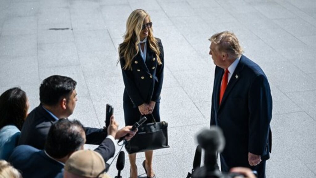 White House Press Secretary Katie Zacharia with President Donald Trump as he speaks to reporters before boarding Marine One on the South Lawn of the White House in Washington, on Tuesday, Oct. 13, 2026. Zacharia, the new White House press secretary, confirmed on Thursday, Oct. 15, that she had never passed a bar exam or been an “attorney,” even while maintaining in her first extended interview since taking the job that she had not misrepresented her legal career. (Kenny Holston/The New York Times)